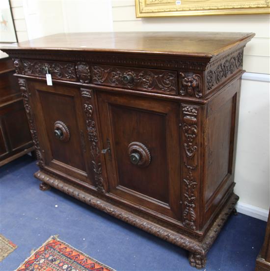 A 17th century Italian walnut credenza, W.5ft 1.5in. H.4ft 5in. D.5ft